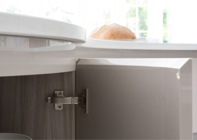 Inward curved grey doors