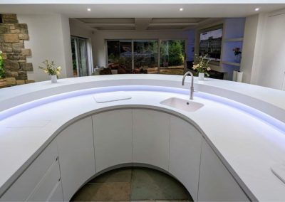 Inward white curved doors